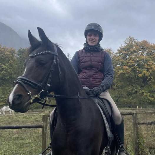 Jules mounted on her horse